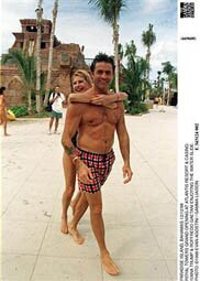 Paradise Island, Bahamas 12/12/98 (669600) Royal Towers Grand Opening At Atlantis Resort & Casino. Ivana Trump & Roffredo Gaetani Enjoying The Water Slide. (Photo By Evan Agostini/Getty Images)