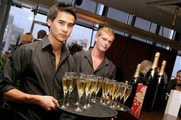 SYDNEY, AUSTRALIA - APRIL 02:Waiters serve Champagne at the launch of the Astral Champagne Bar in Star City Casino on April 2, 2008 in Sydney, Australia. (Photo by Mike Flokis/Getty Images)